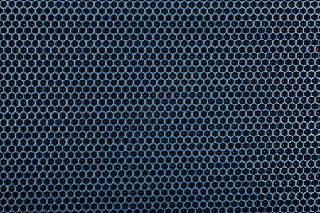 蓝色六边形打孔EVA-乙烯醋酸乙烯酯泡沫地毯平面全框纹理和背景图片