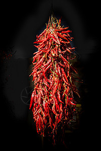 阳光下干燥的红胡椒包干辣椒胡椒寒冷蔬菜市场红色食物香料营养植物图片