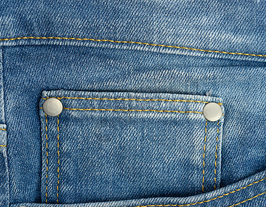蓝色经典牛仔裤前袋牛仔布织物棉布纺织品服装按钮材料帆布裤子衣服图片