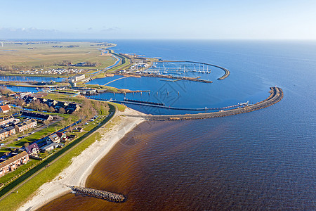 来自荷兰IJsselmeer的港口和城市斯塔沃伦航空村庄天线长廊海岸线风景历史支撑景观游艇海滩图片