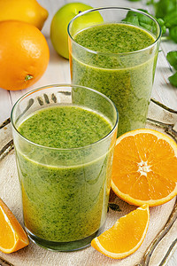 健康的绿色冰淇淋和菠菜装在玻璃罐子里活力奇异果果汁蔬菜饮料奶昔橙子饮食乡村排毒图片