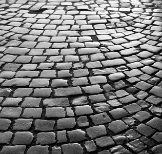 石头铺路纹理花岗岩城市反思街道旅行人行道鹅卵石路面地面材料图片