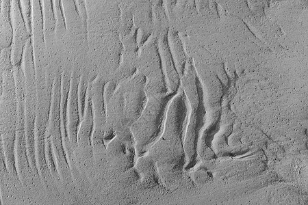 湿沙背景纹理中的涟漪海岸线棕色海岸波纹岩石海洋旅行白色海滩沙丘图片