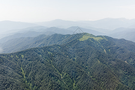 夏季高加索山丘顶峰峡谷旅行山脉绿色闲暇天空岩石阳光荒野图片