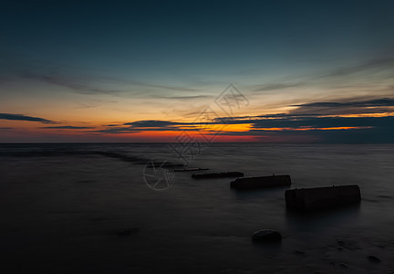 海上旧的混凝土码头海景蓝色日出海岸线海滩海岸旅游天空旅行渔夫图片