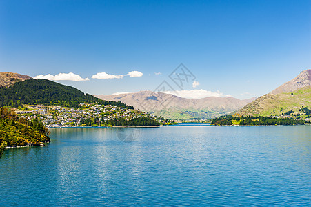 新西兰瓦卡提普湖和皇后镇墙纸峡湾天空远景蓝色高山反射环境山脉海岸图片