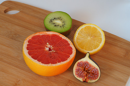水果 柑橘和异国情调 切成两半橙子维生素黄色甜点热带红色柚子柠檬果汁奇异果图片