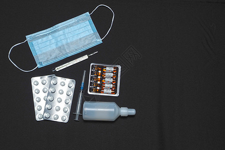 药剂和个人防护设备 大流行性 冠状病毒保护药店药品抗生素黑色家庭急救箱治疗药片口罩图片