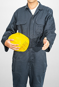 站在蓝色封面上站着的工人 都拿着硬帽手臂导师头盔安全男性男人制造业检查员工作室塑料图片