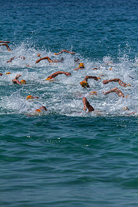 游泳运动员闲暇泳装速度体育竞赛海洋团体训练手臂钢铁侠图片