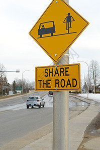 自行车巷路标指示牌旅行邮政车辆街道运输安全交通车道钻石图片