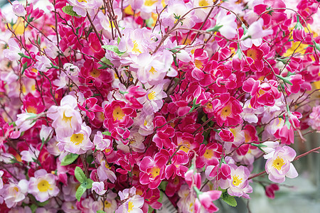 人造多彩多姿的花特写作为背景婚礼花瓣花束生日植物植物群工艺花园礼物艺术图片
