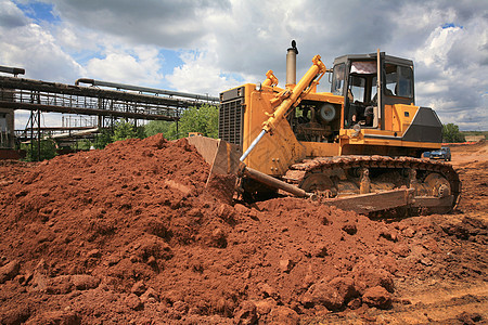 重型强力推土机在一个建筑工地上工作机械废墟挖掘柴油机刀刃车辆操作地面技术拖拉机图片