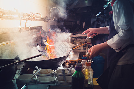 厨师做炒饭食物气体职业炊具蔬菜炒锅美食餐厅平底锅火焰图片