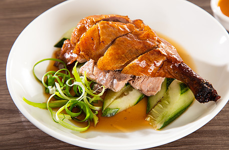 烤鸭米 广受欢迎的鹰类食品鸭子鸡腿美食午餐烹饪黄瓜旅行文化盘子饭馆图片
