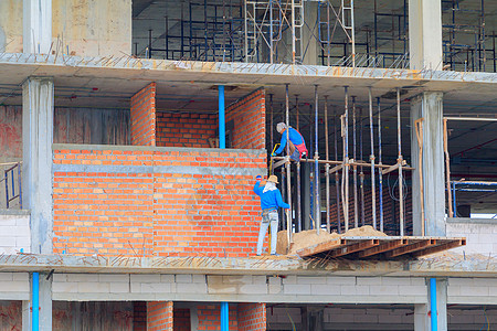 建筑工人建筑物开发劳动力户外工作住房 单位 千人建造职业脚手架房子安全石工建设者工人城市建筑图片