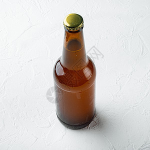 玻璃杯啤酒瓶 白石表面 方形图片