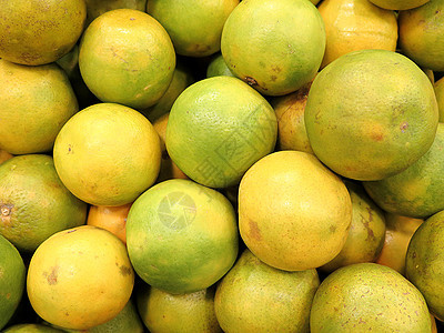 特写新鲜绿色橙子情调果汁异国市场热带小吃水果食物杂货店饮食图片