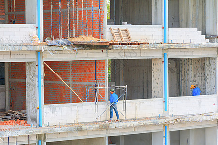 建筑工人建筑物开发劳动力户外工作住房 单位 千人商业石工工人团队项目基础设施金属团体工程男人图片