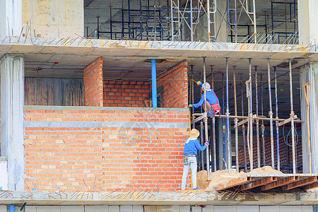 建筑工人建筑物开发劳动力户外工作住房 单位 千人基础设施团队金属建设者安全制造业模具劳动水泥项目图片