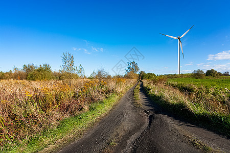 带风力涡轮机的绿草地风车环境涡轮力量绿色爬坡发电厂太阳螺旋桨金属图片