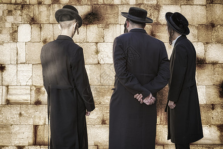 在犹太人节那天犹太人在西墙祈祷背景