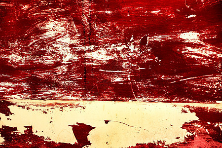 生锈金属斗上旧油漆的红色质感图片