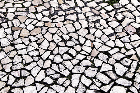 里斯本一条街道的铺砌地板城市人行道铺路材料海浪石头传统地面路面岩石图片