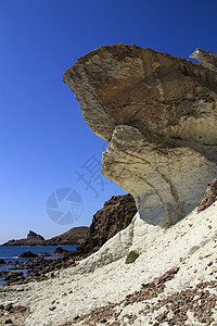 阿尔梅里亚加塔湾的美丽火山岩层石灰石地质砂岩海岸线海滩旅行荒野地质学海岸岩石图片