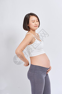 怀孕妇女感到疼痛 背痛 家里有孕妇 有紧张症 难受腹部母亲女士女性母性妈妈婴儿父母肚子背景图片