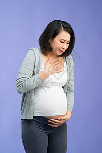 怀孕八个月的亚洲妇女恶心地恶心女性母亲母性痛苦肚子成人疾病腹部呕吐图片