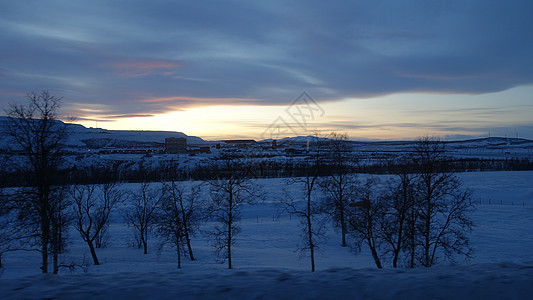 日落时冬天瑞典的风景旅行阳光城市假期山脉公园蓝色季节天空太阳图片