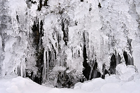 冻结流 美丽的冬天自然背景 冬天的霜雪旅行摄影岩石冰柱场景天空运动流动风景溪流图片