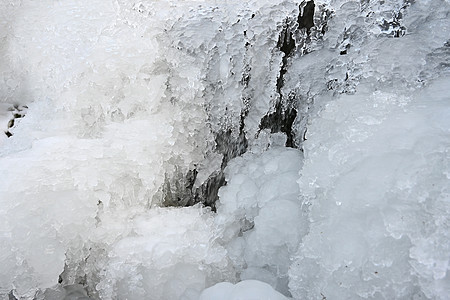 冻结流 美丽的冬天自然背景 冬天的霜雪冻结瀑布树木摄影流动水晶岩石蓝色冰柱石头图片