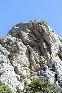 克里米亚岩石和天空 阳光秋天 前视碎石历史秀场日光地标悬崖砂岩风景瘢痕高原图片