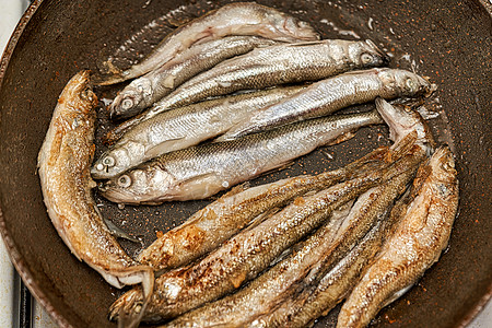 黑木瓜里烤面包的欧洲熔岩海鲜饮食宏观美食油炸小吃烹饪午餐传统盘子图片