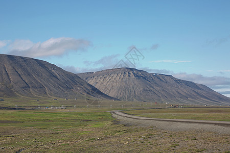 挪威Spitsbergen的长年比延附近美丽的自然和景观海浪风景港口海洋悬崖群岛气候冒险峡湾天空图片