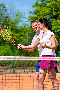 网球运动教师教妇女玩游戏活动教学老师法庭游戏男人俱乐部闲暇学习网球场图片