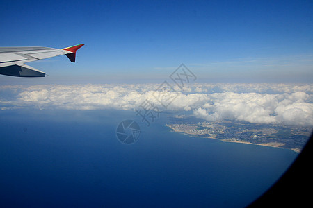 飞行期间的飞机窗口飞机场客机空气维修机身假期座位旅行航空公司驾驶仪图片