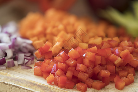 红铃辣椒美食蔬菜烹饪胡椒洋葱红色砧板食物图片