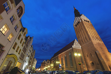 埃尔布拉格圣尼古拉大教堂日落建筑学天际旅行教会蓝色街道建筑天空城市图片