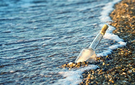 邮寄邮件海洋玻璃蓝色抛弃文档沉船孤独瓶子帮助棕色图片