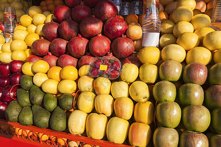 马拉克什的果汁摊位城市生活旅行水果市集街道麦地正方形教会市中心天空图片