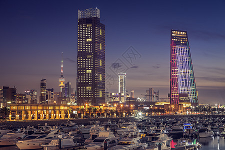 晚上看电脑科威特市晚上的天线旅行天际码头日落城市摩天大楼天空街道首都港口背景