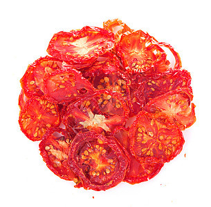 木制背景的干西红柿 顶视图香料蔬菜厨房食物小吃种子香气团体烹饪桌子图片