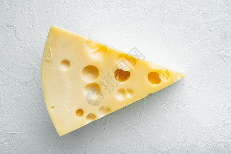 白色电线Maasdam奶酪 在白石表面 顶端的视野平坦背景