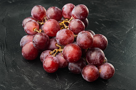 红葡萄和白葡萄 深红水果 黑石本底图片
