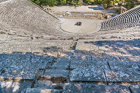 希腊Epidaurus剧院石头大理石地标废墟旅行文化座位历史建筑学脚步图片