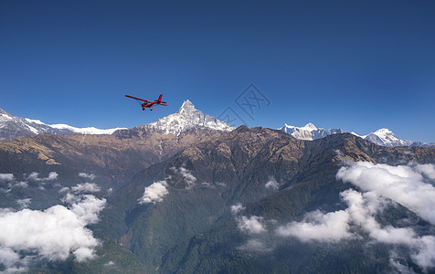 超轻型飞机飞越Pokhara和Annapurna地区上空旅游跳伞三轮车风险空气运动蓝色航班行动旅行图片