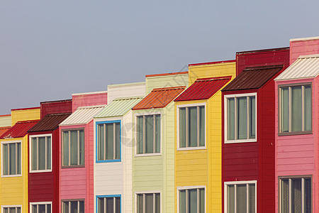 加尔维斯顿海滩旁的多彩公寓街道日落蓝色城市生活日出房子旅行市中心景观地标图片